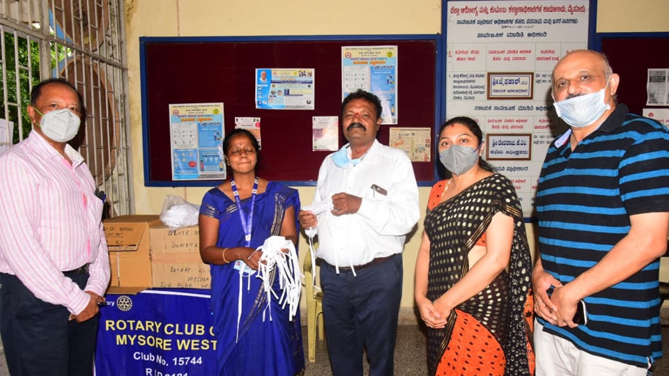 Rotary West donates 1,500 masks to DHO