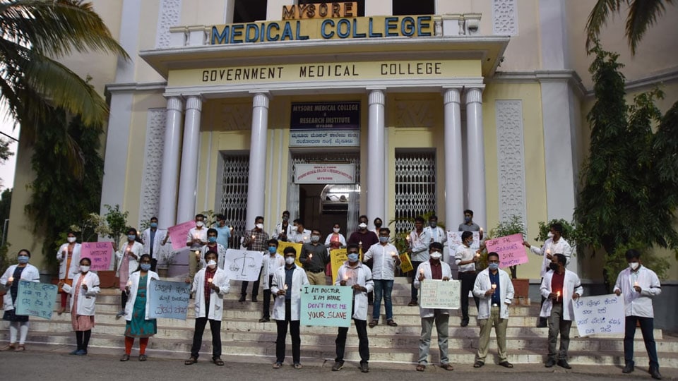 Resident Doctors hold silent candle light protest