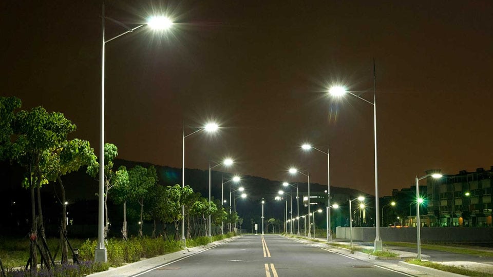 Install automatic street light controllers to save energy and money