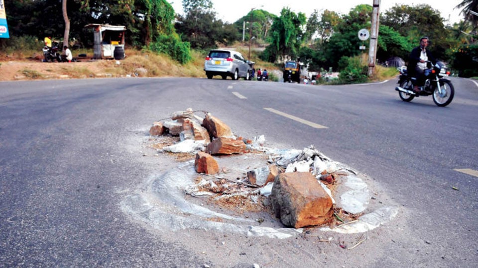 Shift manholes from the centre of roads to sides