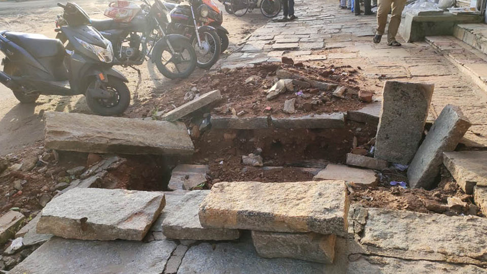 Stone slabs not laid after footpath works at Shivarampet