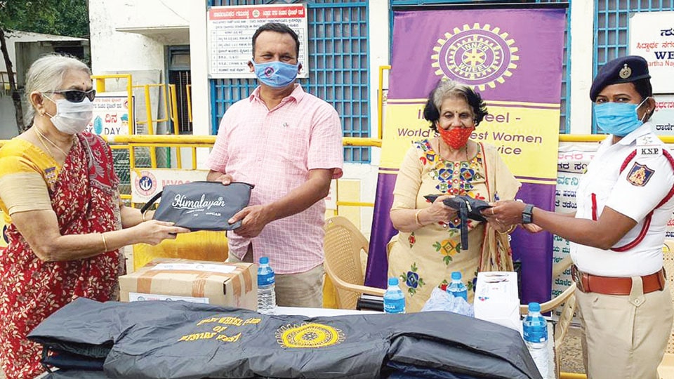 Inner Wheel Club donates rain coats, masks and sanitisers to Traffic Police