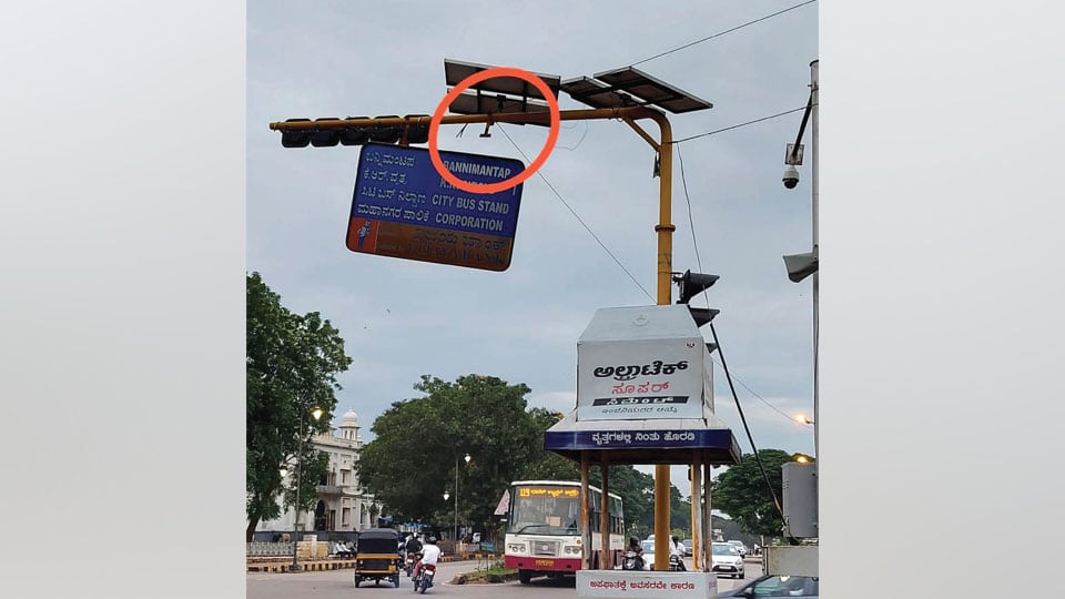 Damaged direction board at Basaveshwara Circle