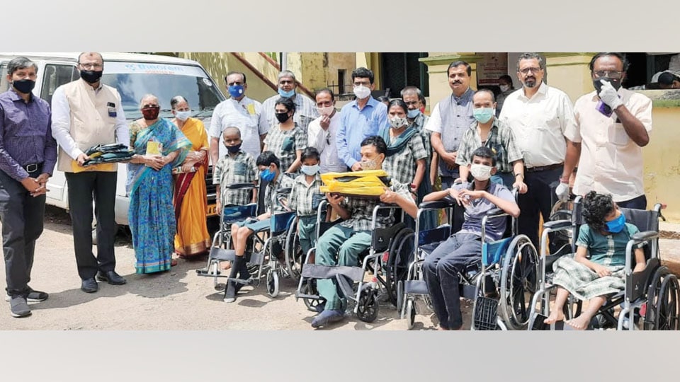 Wheelchairs donated to needy children