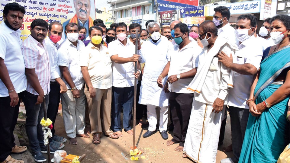 District Minister performs Guddali Puja for road development works