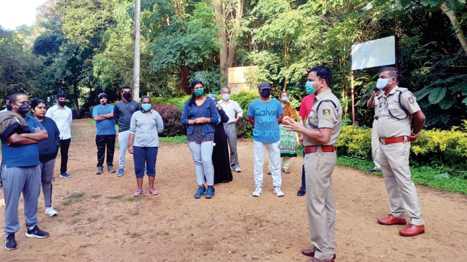 Jayalakshmipuram Police hold COVID awareness drive at Kukkarahalli Lake