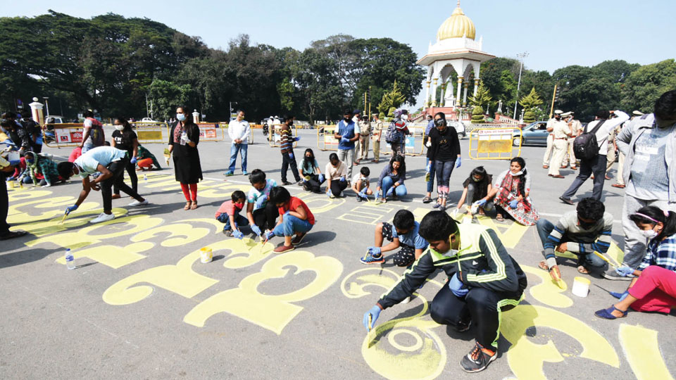 Children draw messages at public awareness campaign against crimes