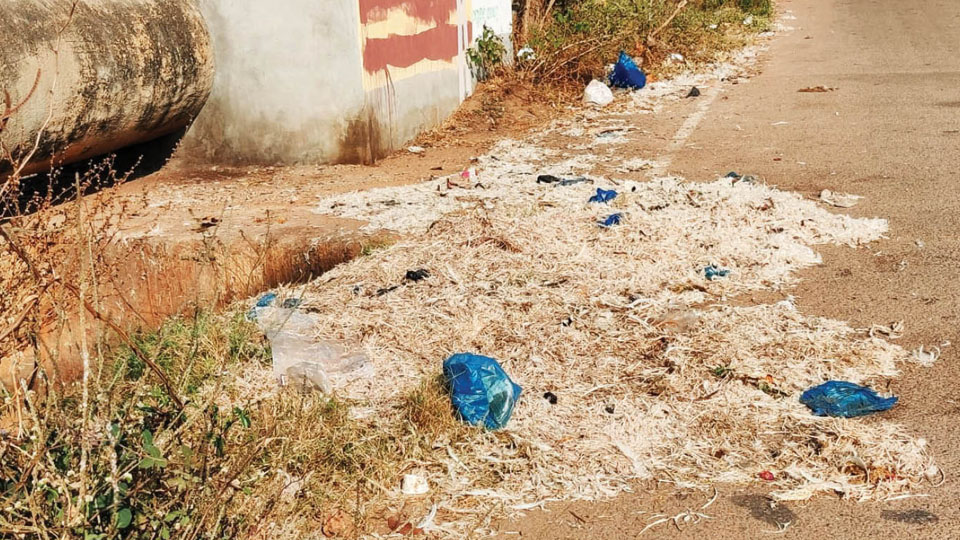Clear chicken waste dumped on Dattagalli Service Road