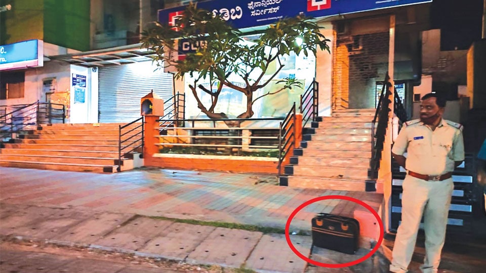 Mysterious bag in front of financial service company creates tension for some time