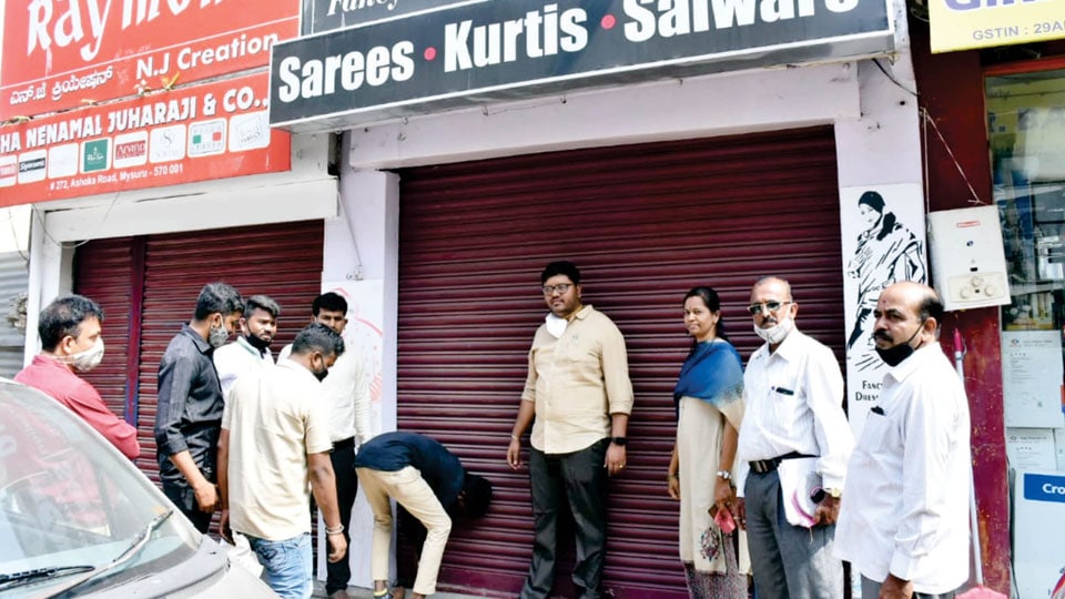 Two shops sealed for not paying tax