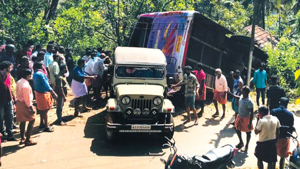 Two children among 7 killed as bus falls on a house