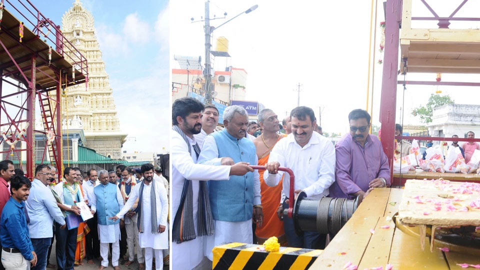 Minister hands over new lift to Chamundi Hill temple authorities