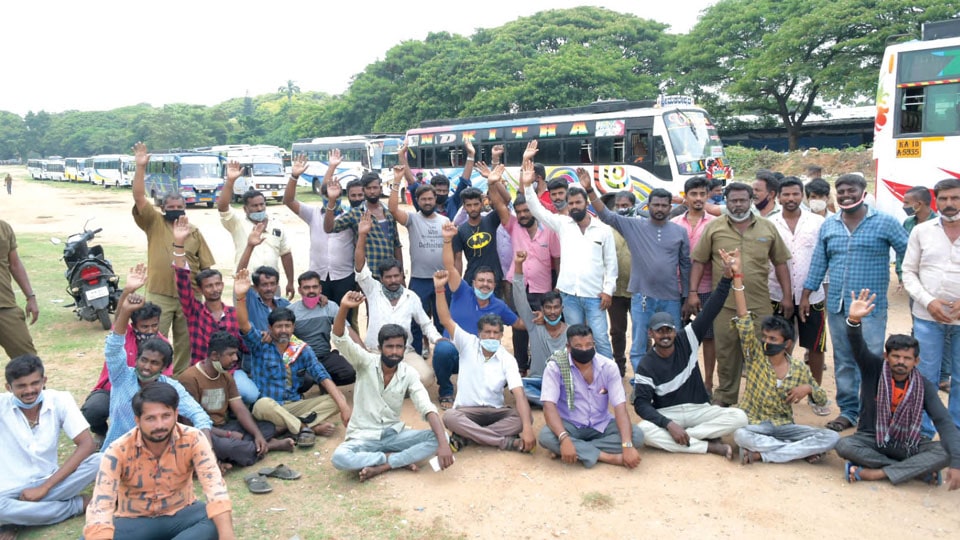 Private bus owners and drivers stage protest against plying of more KSRTC buses