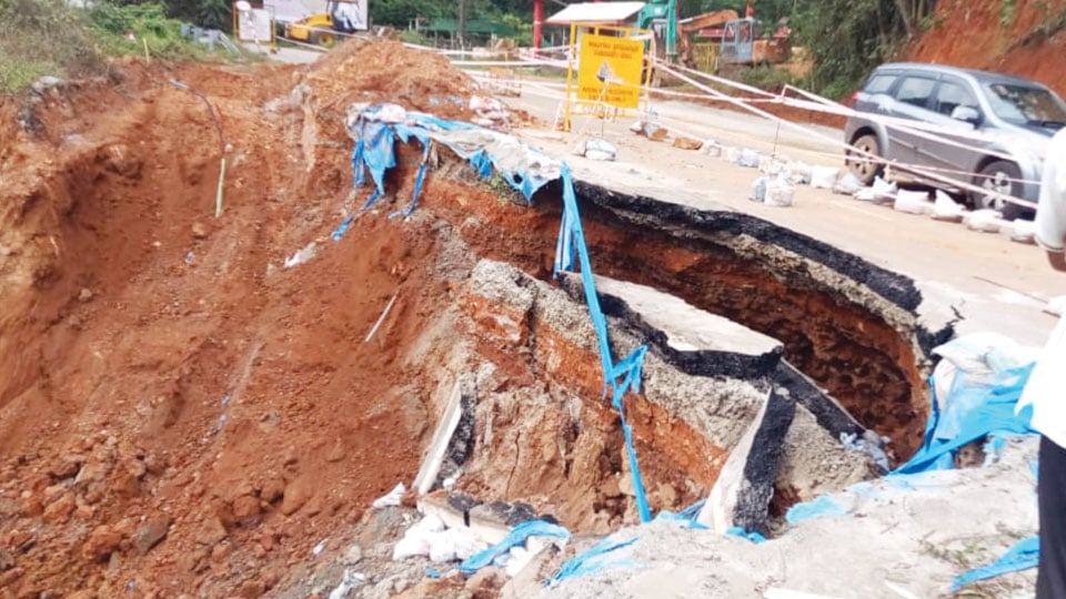 Road caves in near Madikeri; trucks from Mysuru stranded