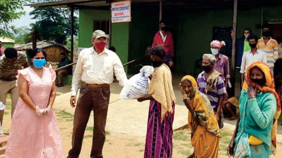 Groceries distributed to Tribals in H.D. Kote
