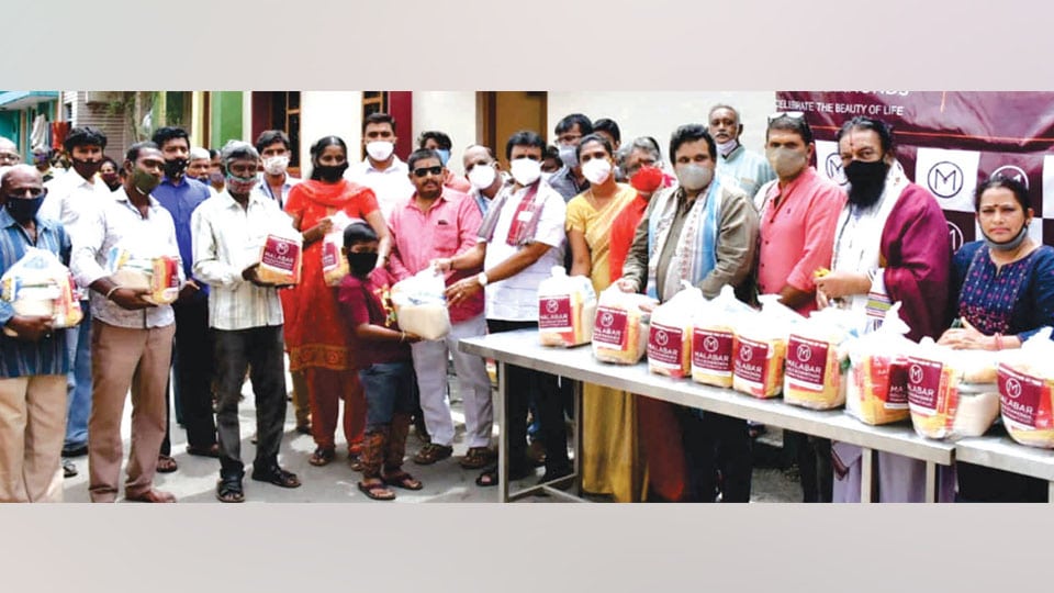 MLA L. Nagendra gives away  grocery kits to poor