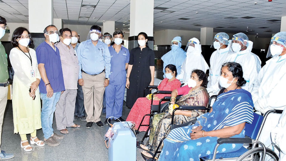 Four ICU treated Corona patients walk back home from Super Speciality Hospital