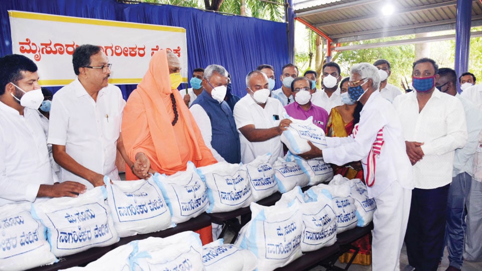 Minister launches ration kits distribution by Mysuru Citizens Forum