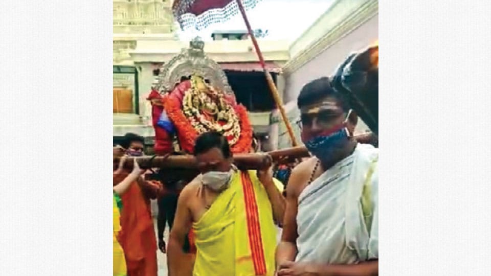 Devotee ban atop Chamundi Hill: Simple but traditional pujas mark first day of Ashada