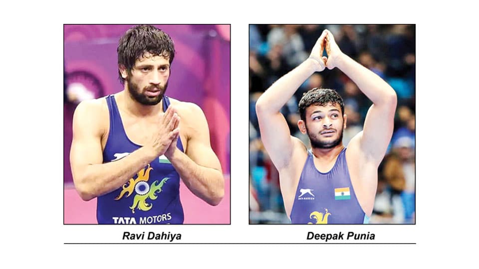 Indian wrestlers keep medal hopes alive