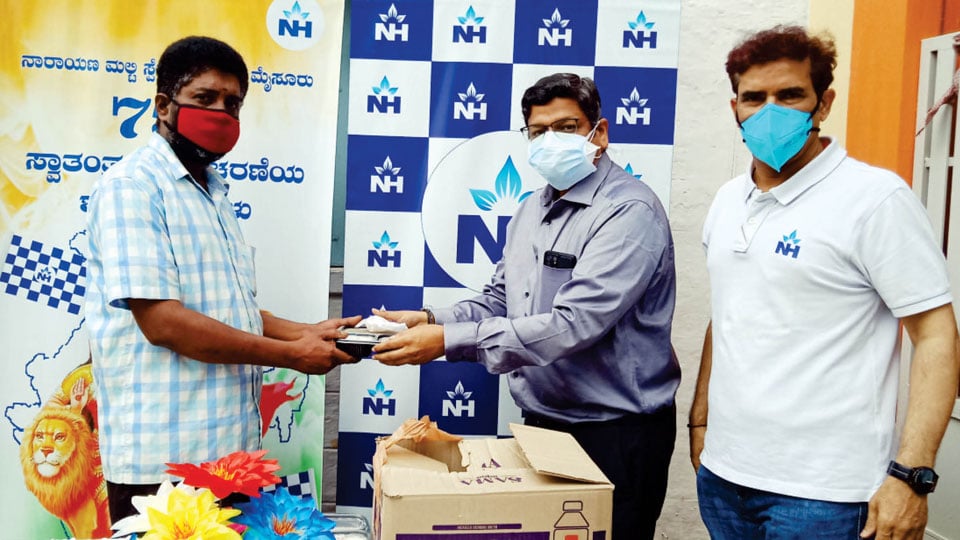 Narayana Hospital distributes food, sweets to handicraft artisans