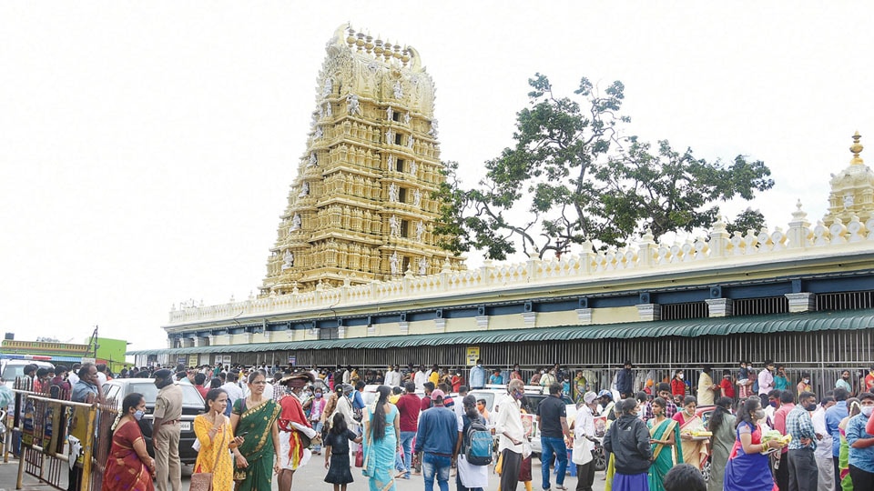 Devotees throng Hill Temple