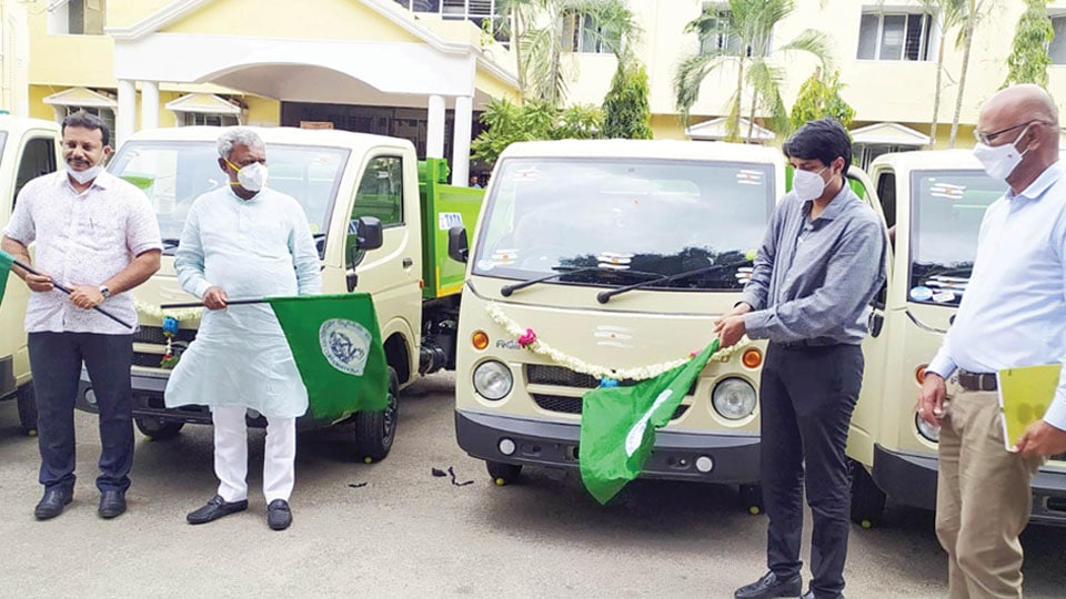 Minister flags off auto tippers for garbage collection