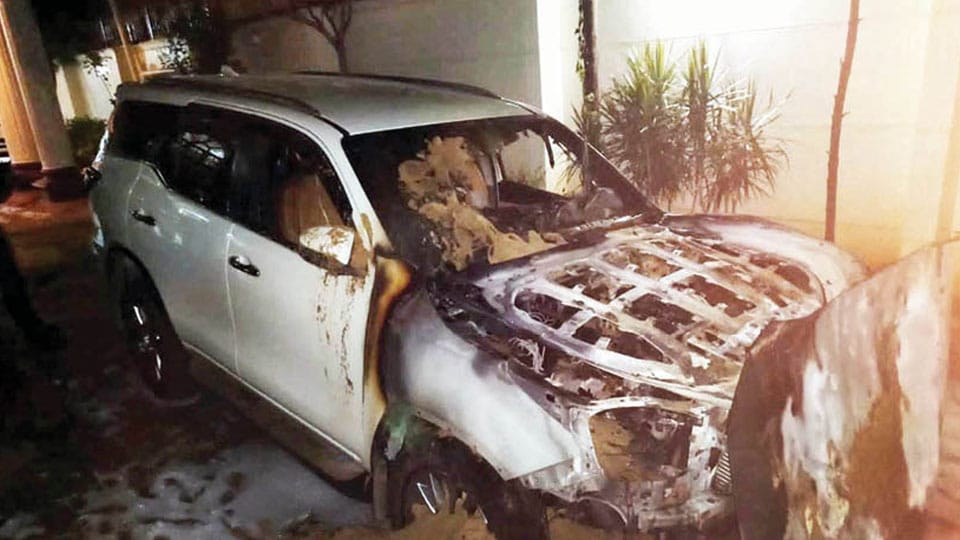 Miscreants set fire to two high-end  cars of BJP MLA Satish Reddy