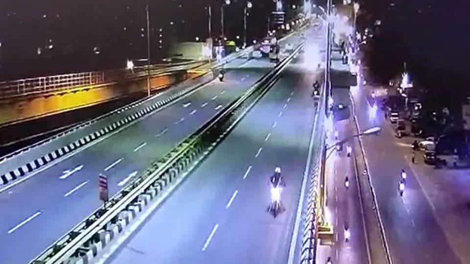 Riders fall to death from flyover after speeding car hits bike
