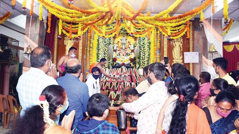 Simple yet traditional Ganesha festival in city