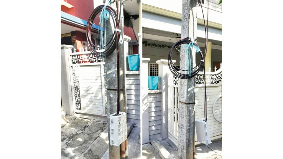 Dangling internet cable junction boxes posing threat to public
