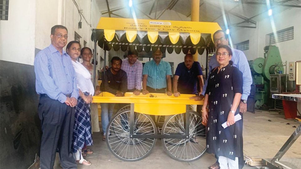 Rotary donates push cart to lady vegetable vendor