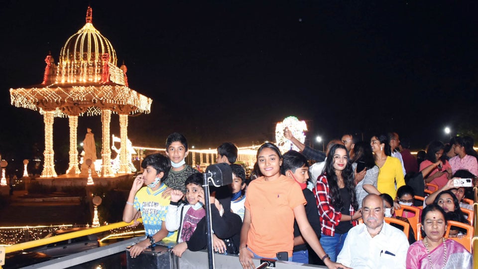 Huge demand for Ambaari bus ride at night amidst lights