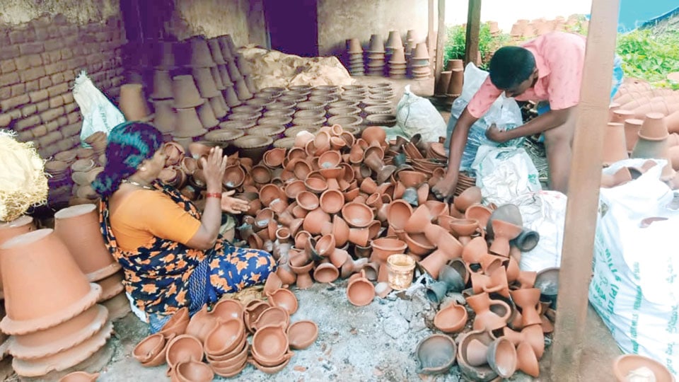 Festival brings no light to clay diya-makers
