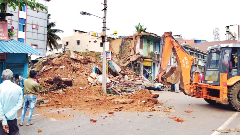 Narrow escape for six as building collapses
