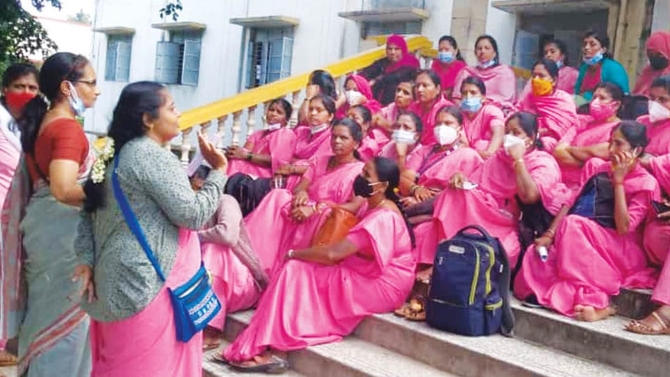 ASHA workers stage protest