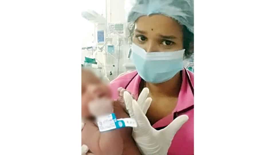 Viral video of nurse playing around with newborn at Cheluvamba Hospital draws criticism