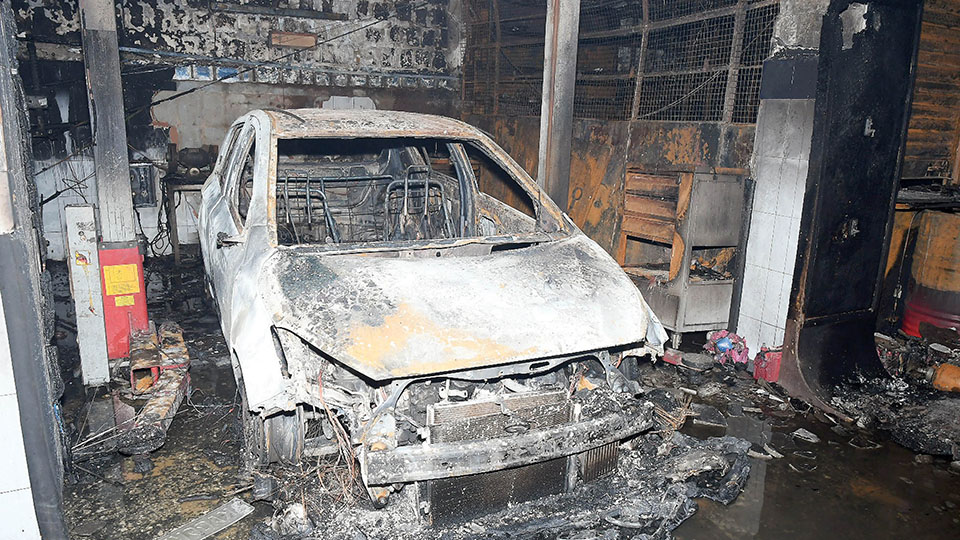 Major showroom fire guts cars, spare parts