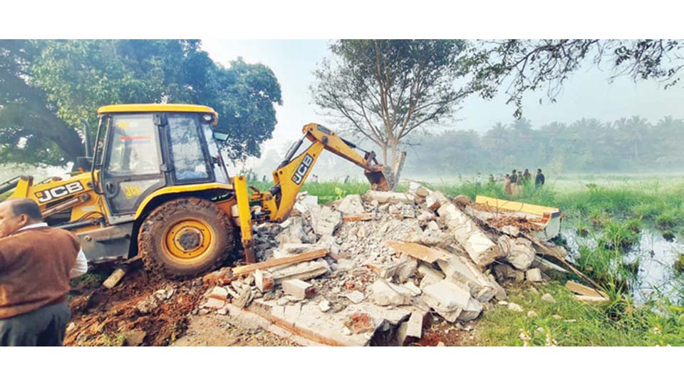 Encroachment clearance drive continues…: MUDA reclaims layout land worth Rs. 170 cr.