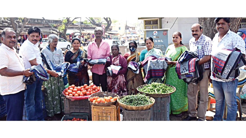 Shawls, sweaters distributed