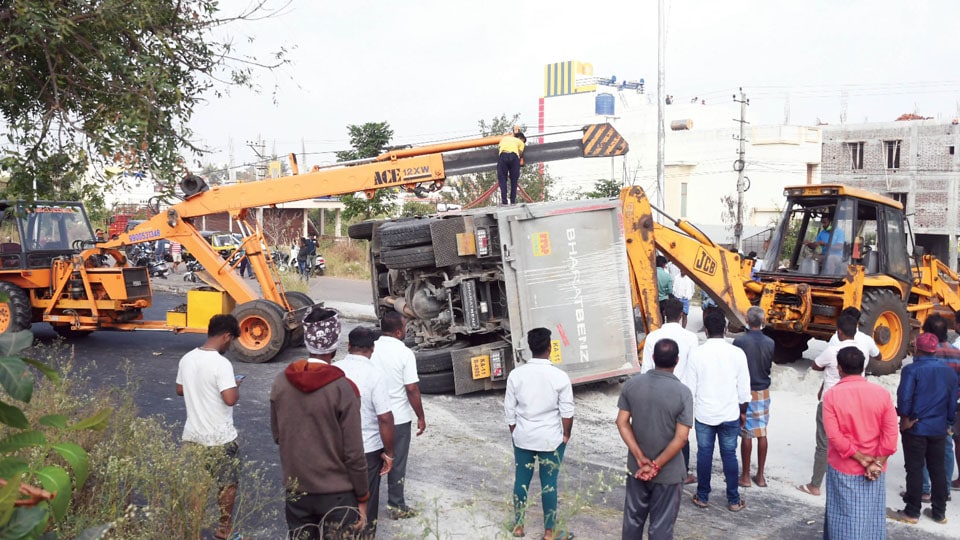 Sand-laden tipper topples on Ring Road
