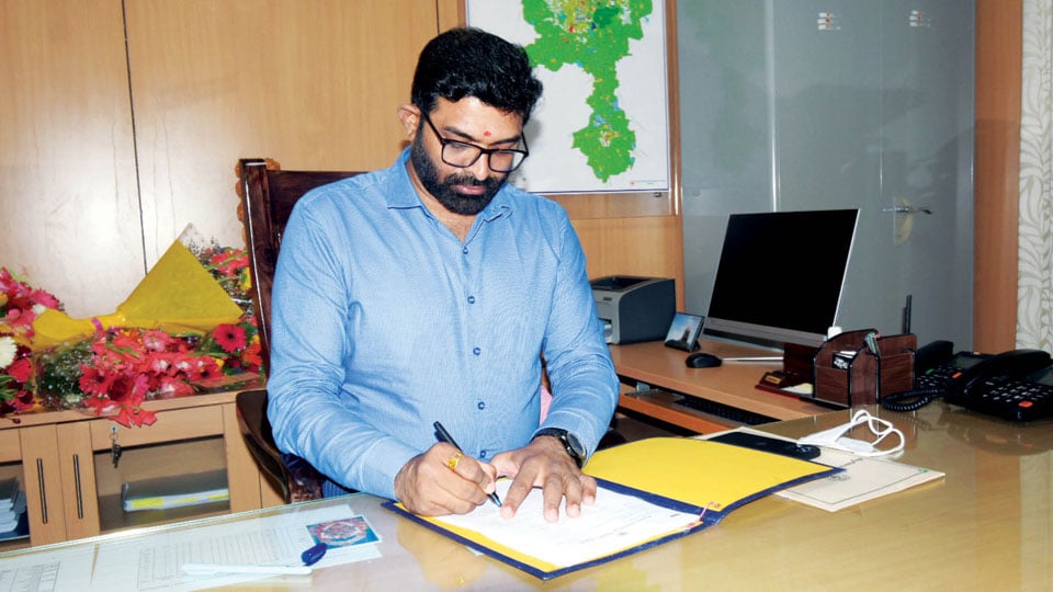 G.T. Dinesh Kumar takes over as MUDA Commissioner