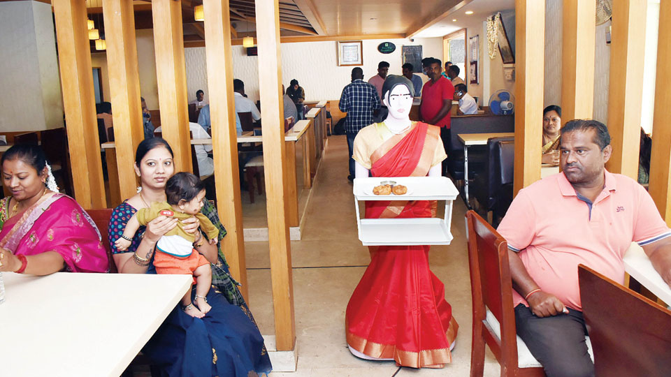 A trend-setter in city’s hospitality sector: Saree-clad robot brings food to table