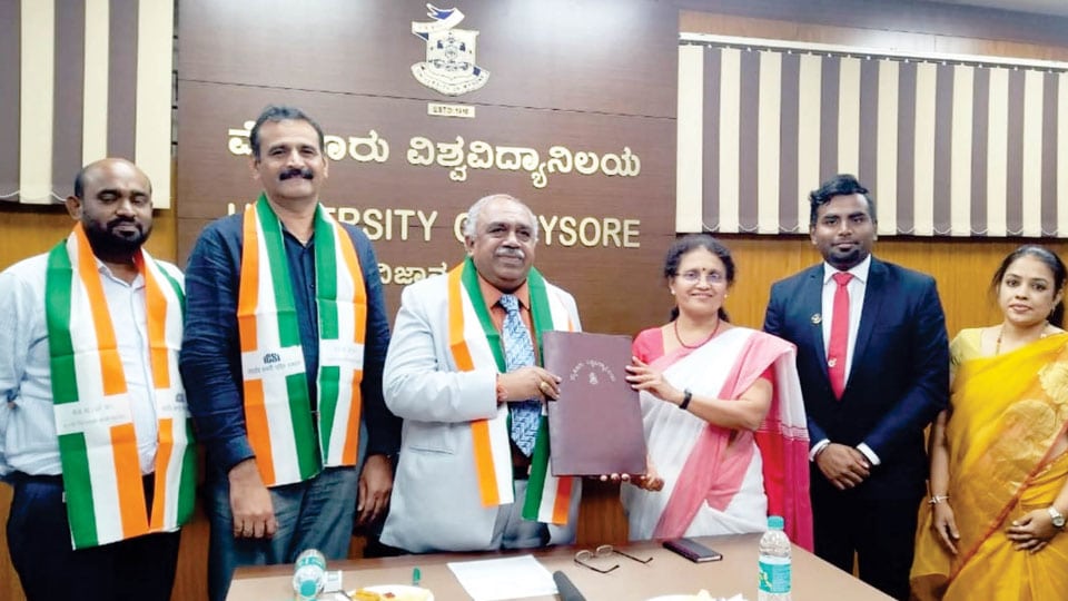 MoU signed between ICSI and University of Mysore