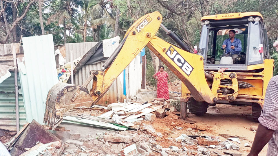 MUDA reclaims encroached land in Gokulam