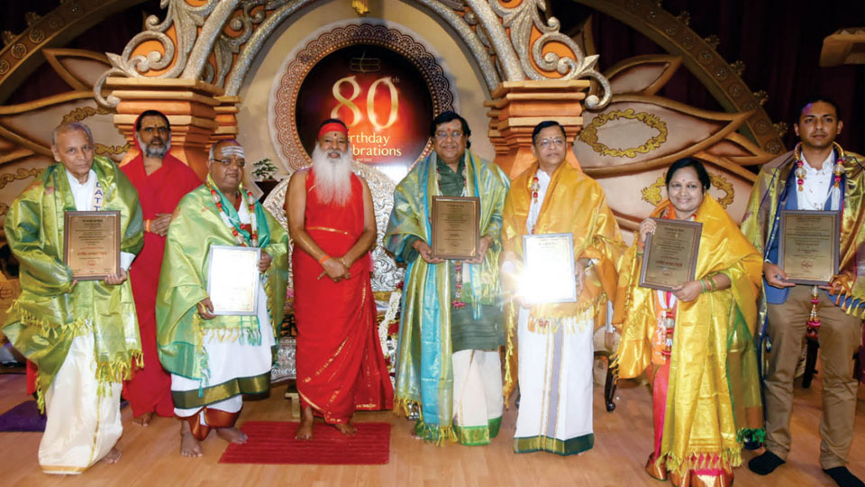 Vedic & music scholars feted at Ashram
