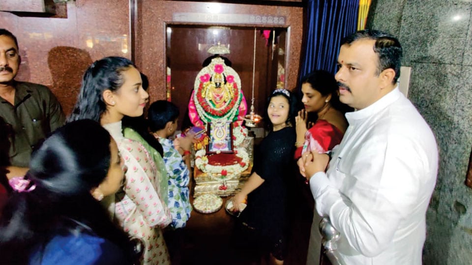 Minister Sunil Kumar, family pray at Nimishamba Temple