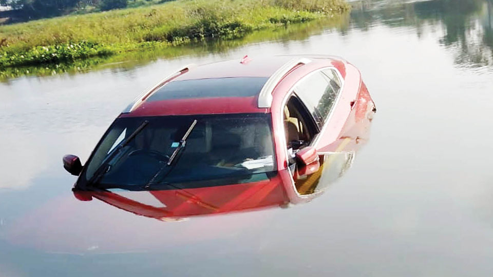 Depressed youth drives BMW into River Cauvery