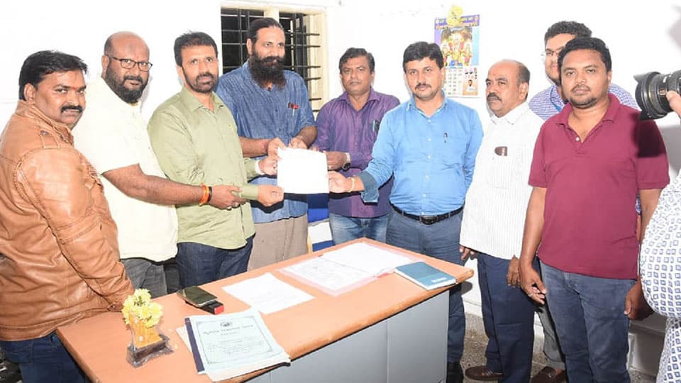 Manjunathapura, Kumbarakoppal Colony residents to get Title Deeds
