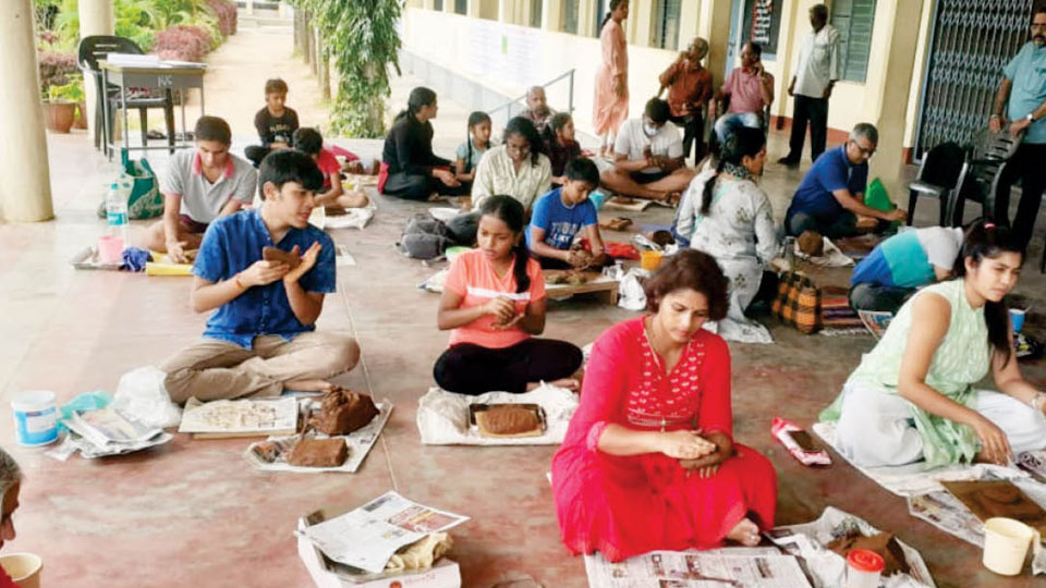 Workshop on making environment friendly clay Ganesha idols